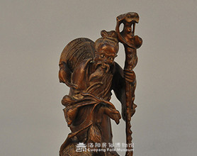 木雕老翁仙鹤像